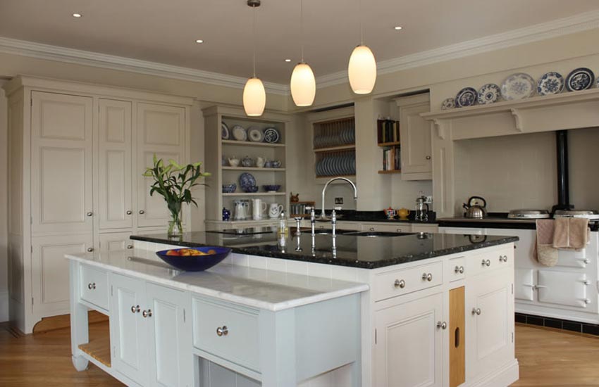 large kitchen with white cupboards