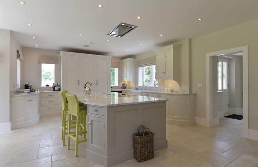 Bespoke kitchen with lime chairs