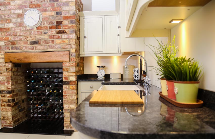 kitchen with black marble worktops