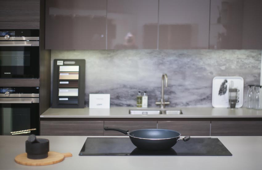 kitchen with purple backsplash